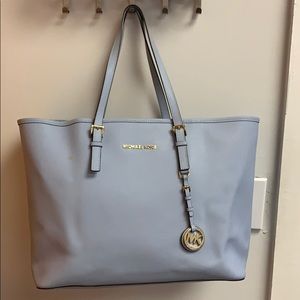 Micheal Kors tote with matching wallet!
